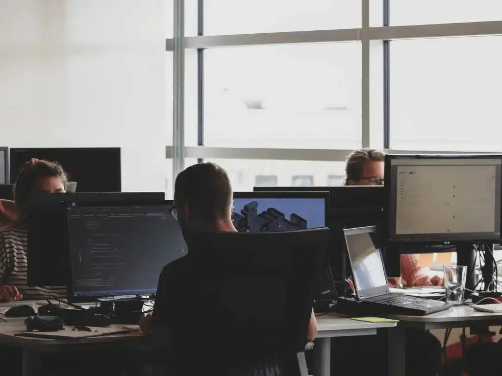 people typing on their computers